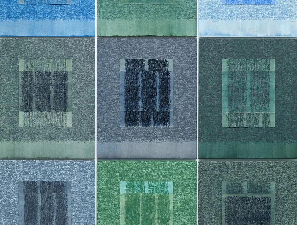 Grid of nine stitched textile panels in blues and greens, each worked into a window-like rectangle