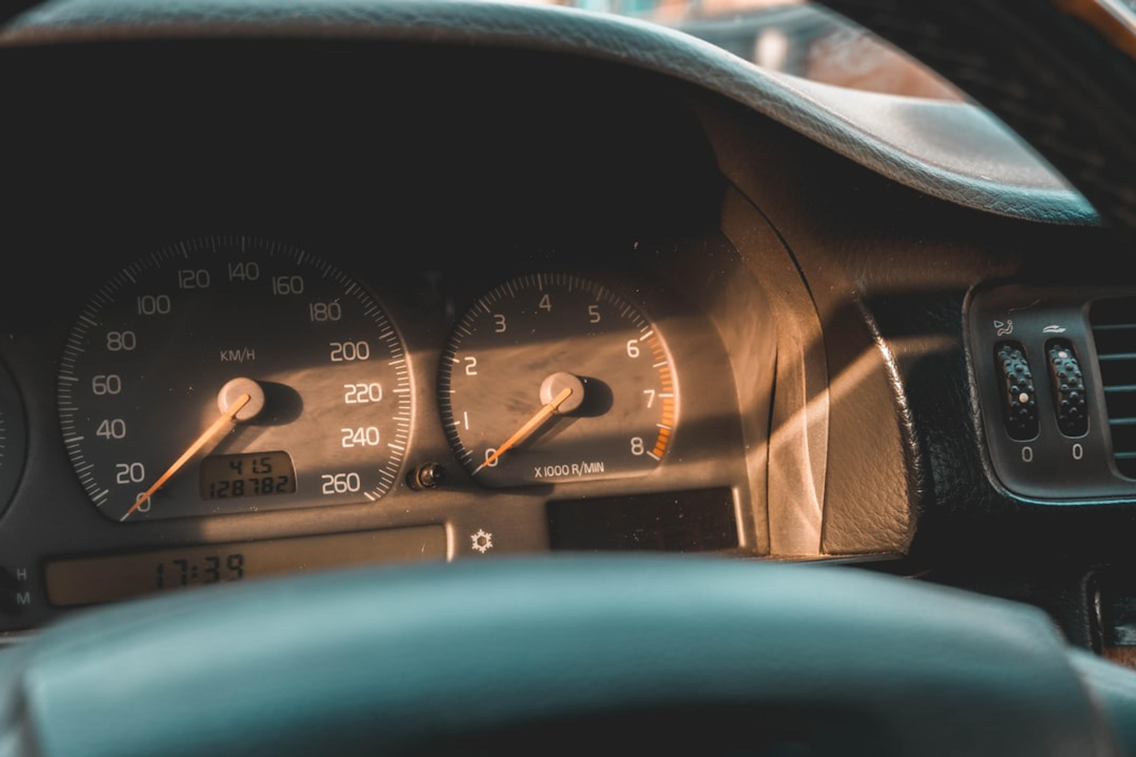the dashboard of a car with a speedometer