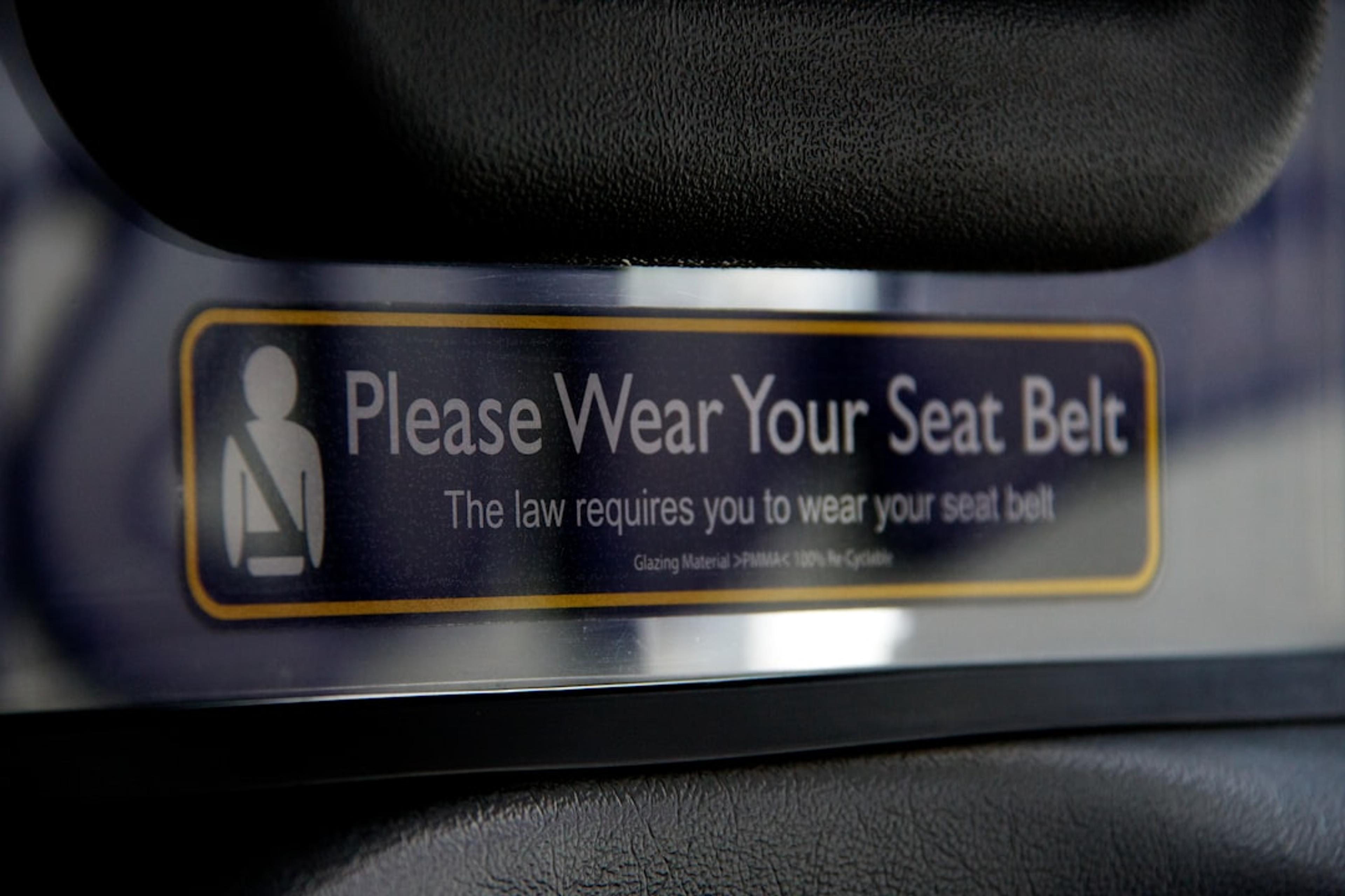 black and gold box on black leather textile