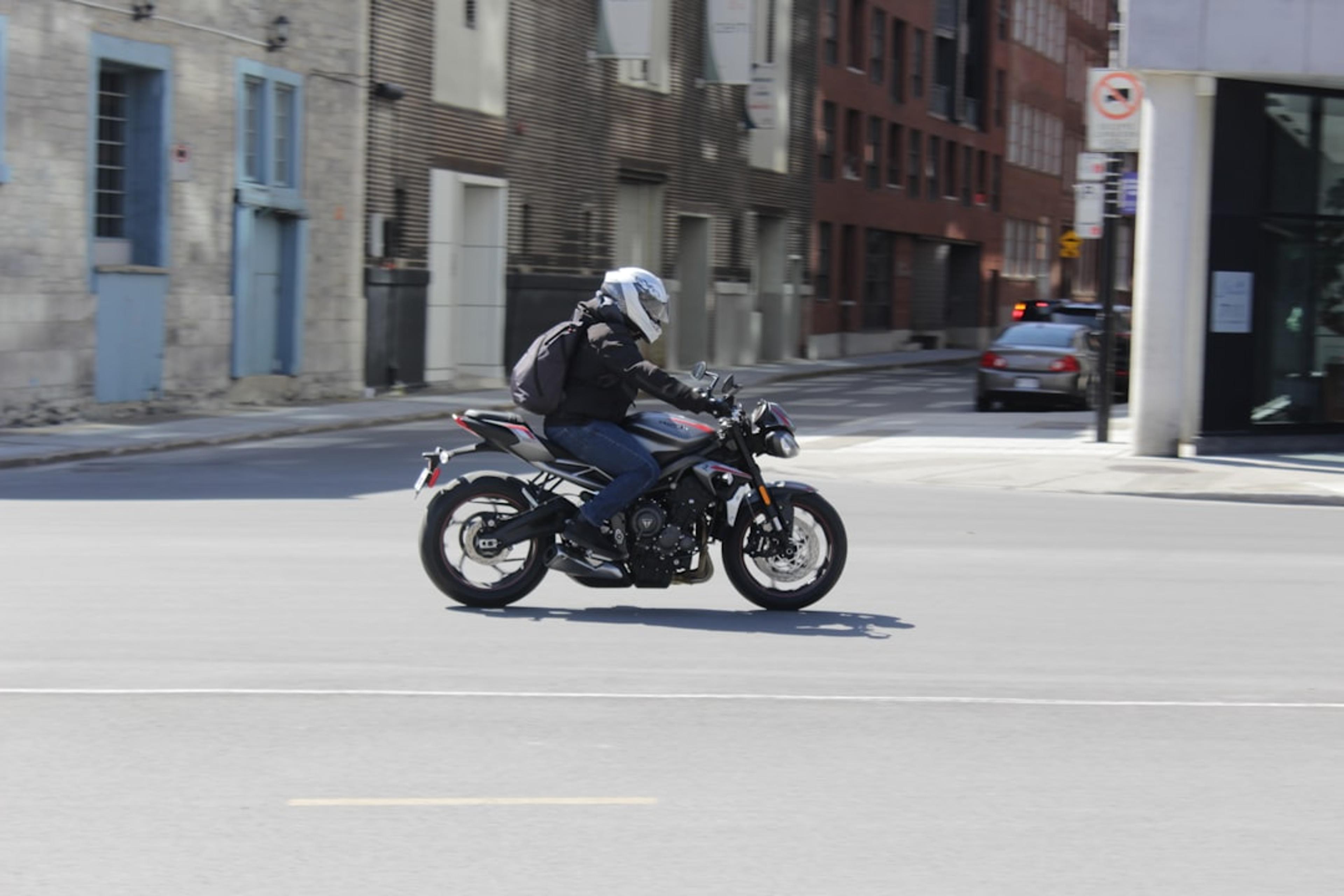 a man riding a motorcycle