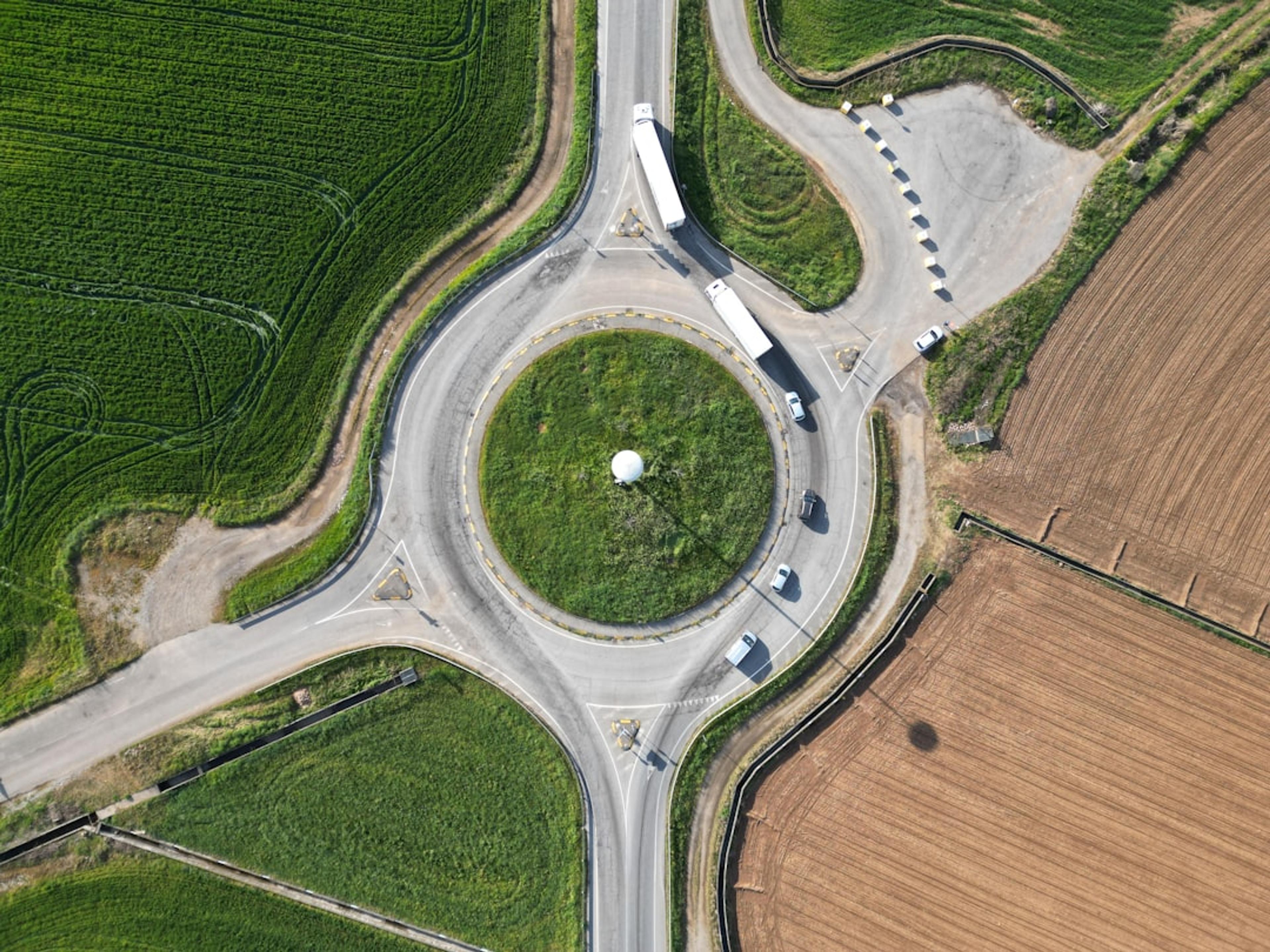 an aerial view of an intersection in a rural area