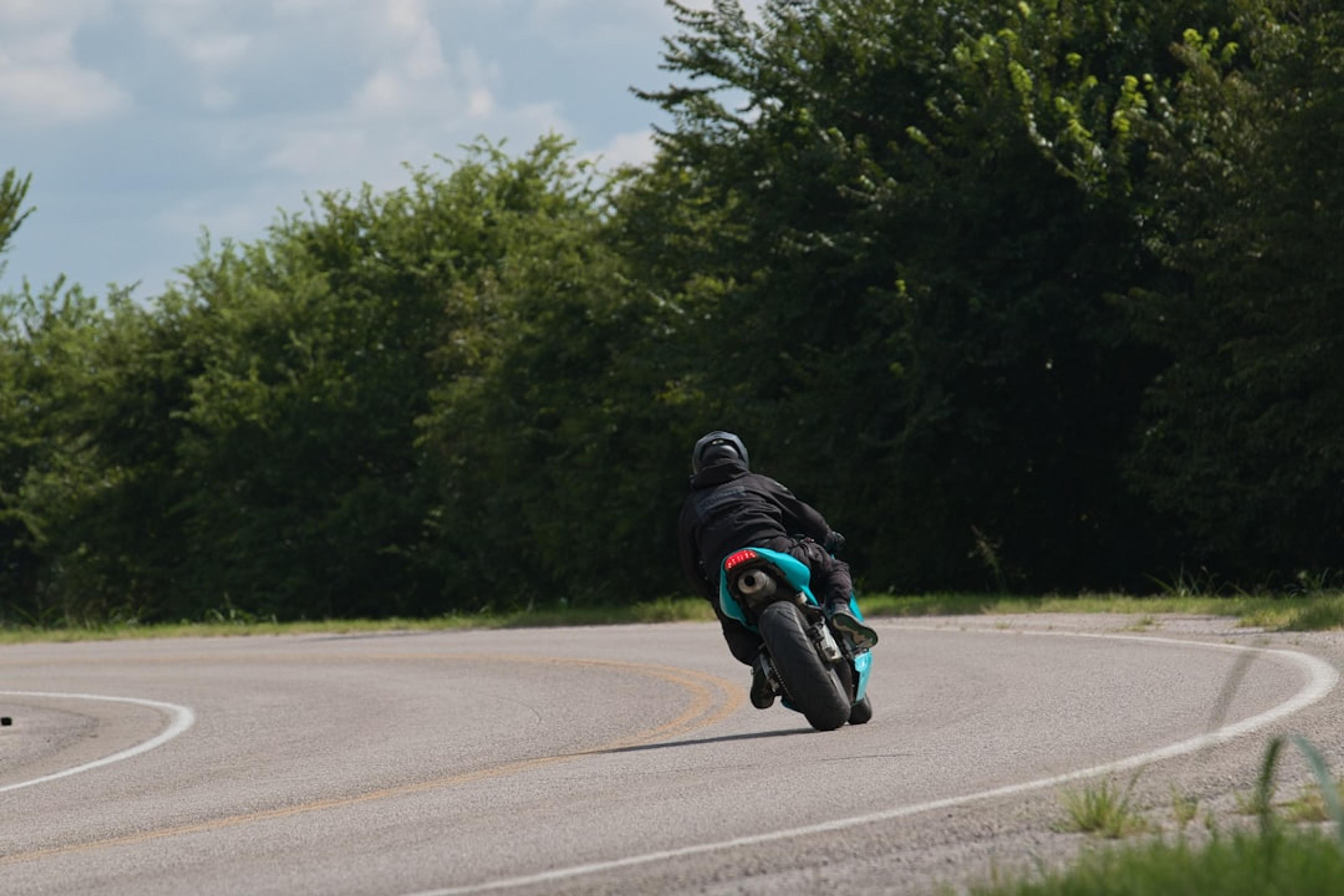 Motorcyclist riding on a winding road
