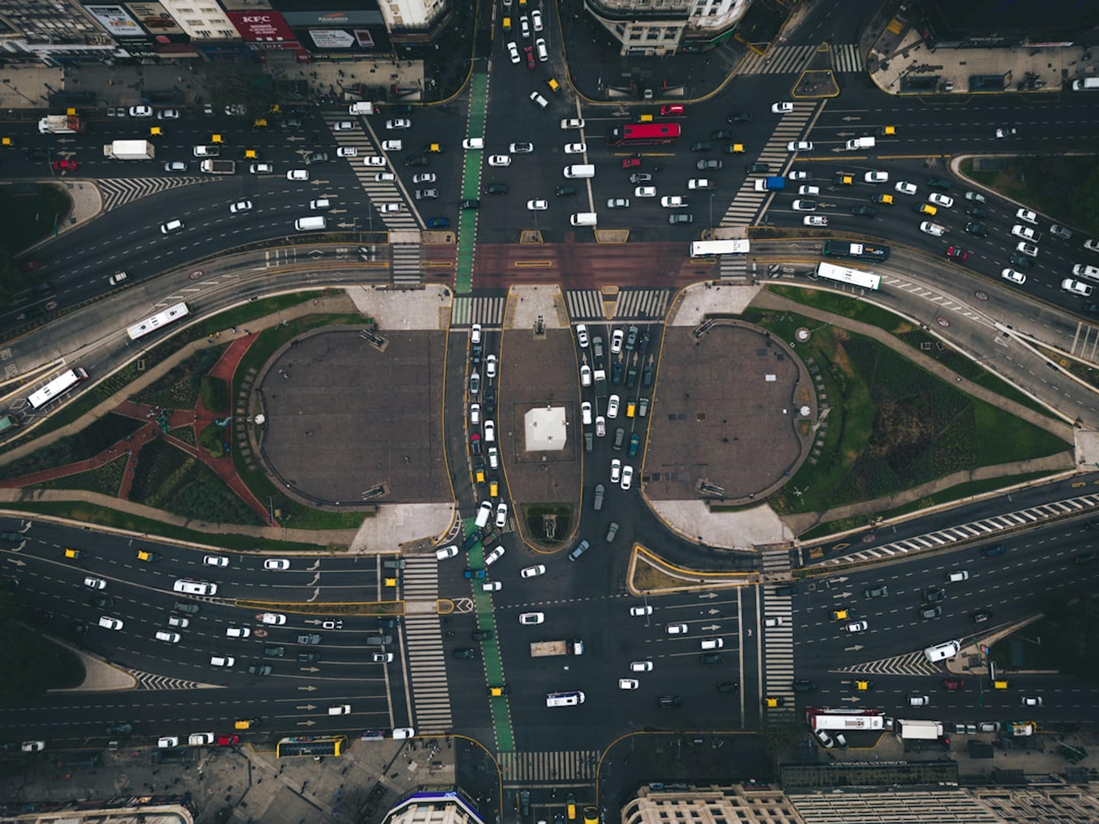 an aerial view of a busy intersection in a city