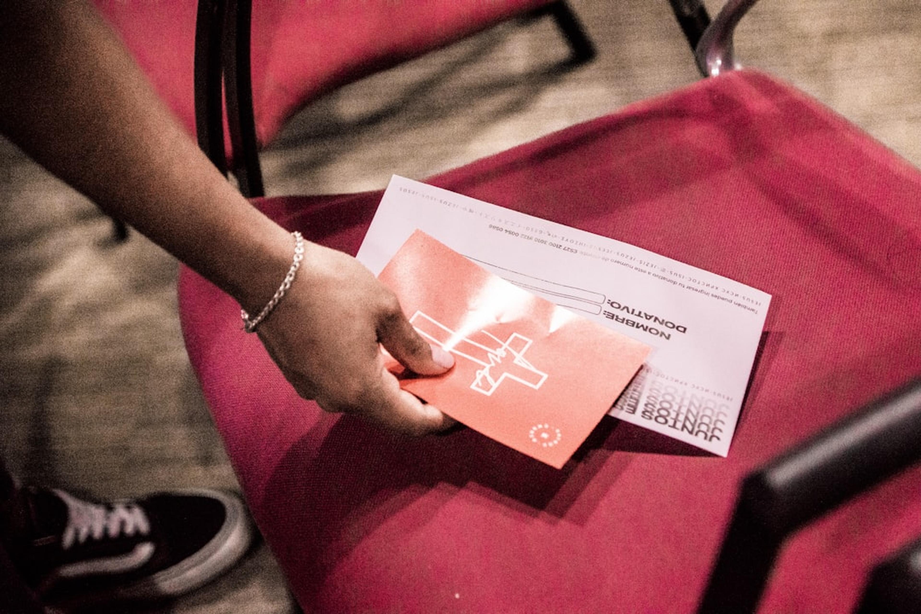 person holding cards