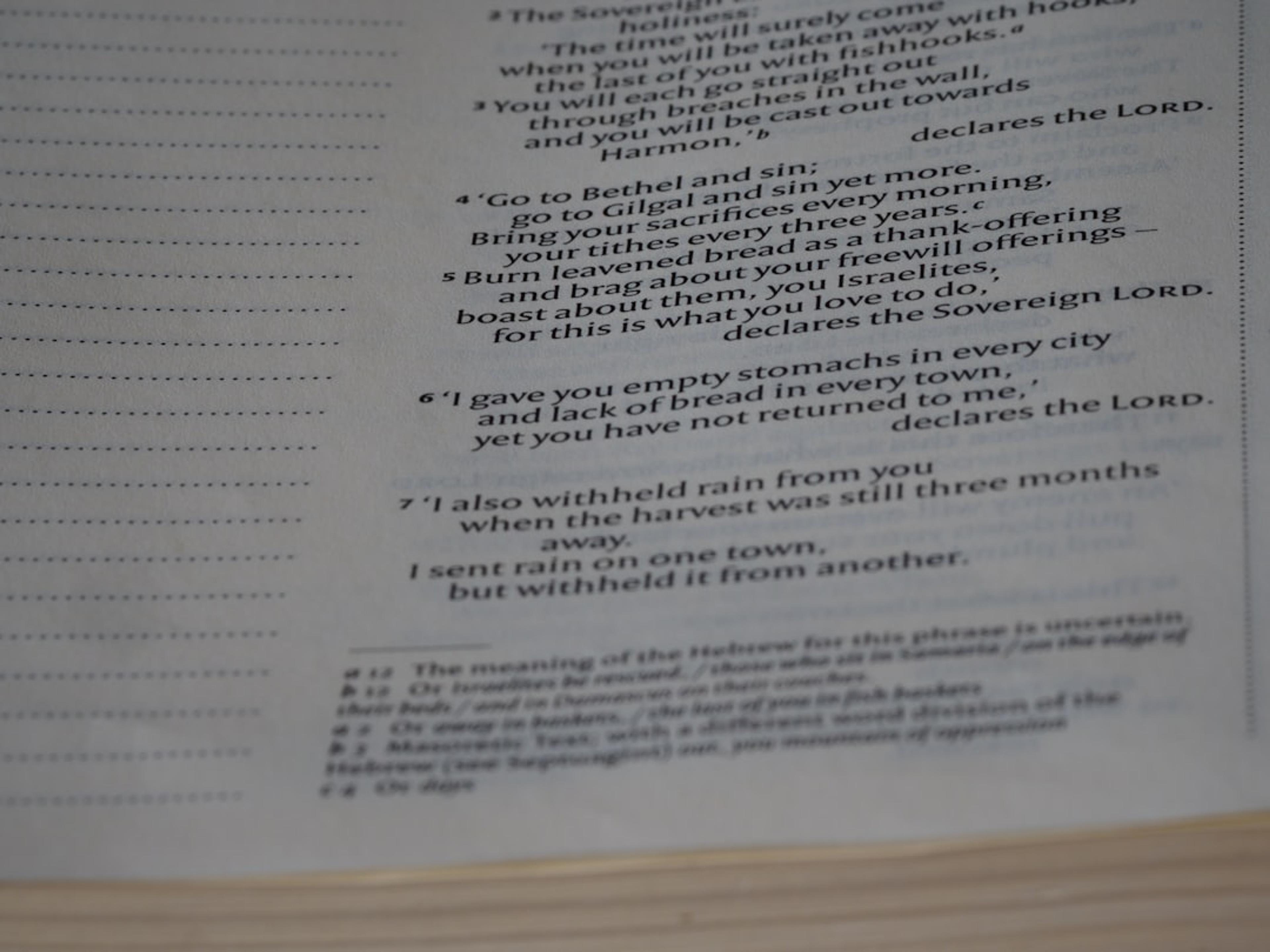 a close up of a book with a poem on it