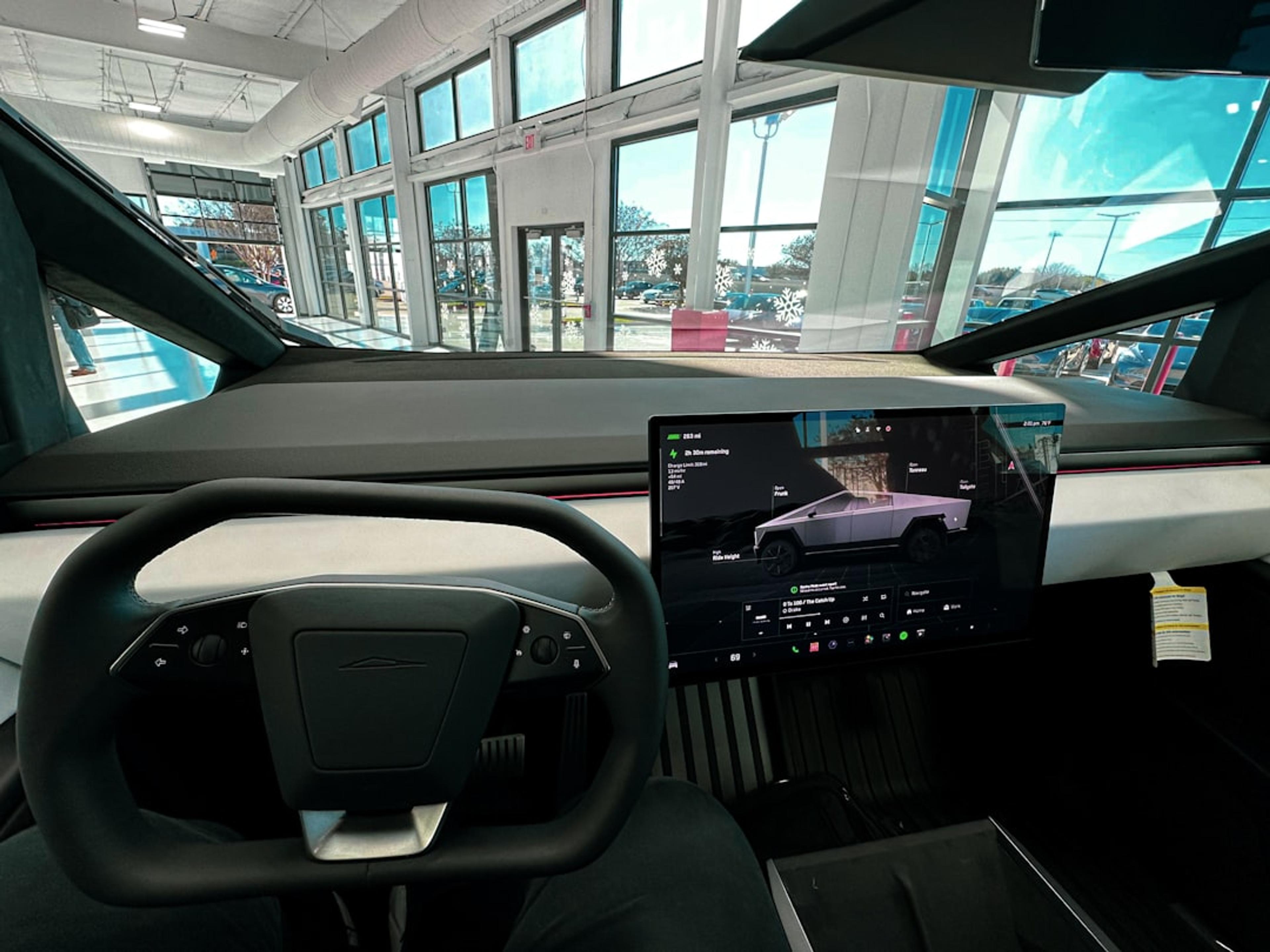 a car dashboard with a laptop on it