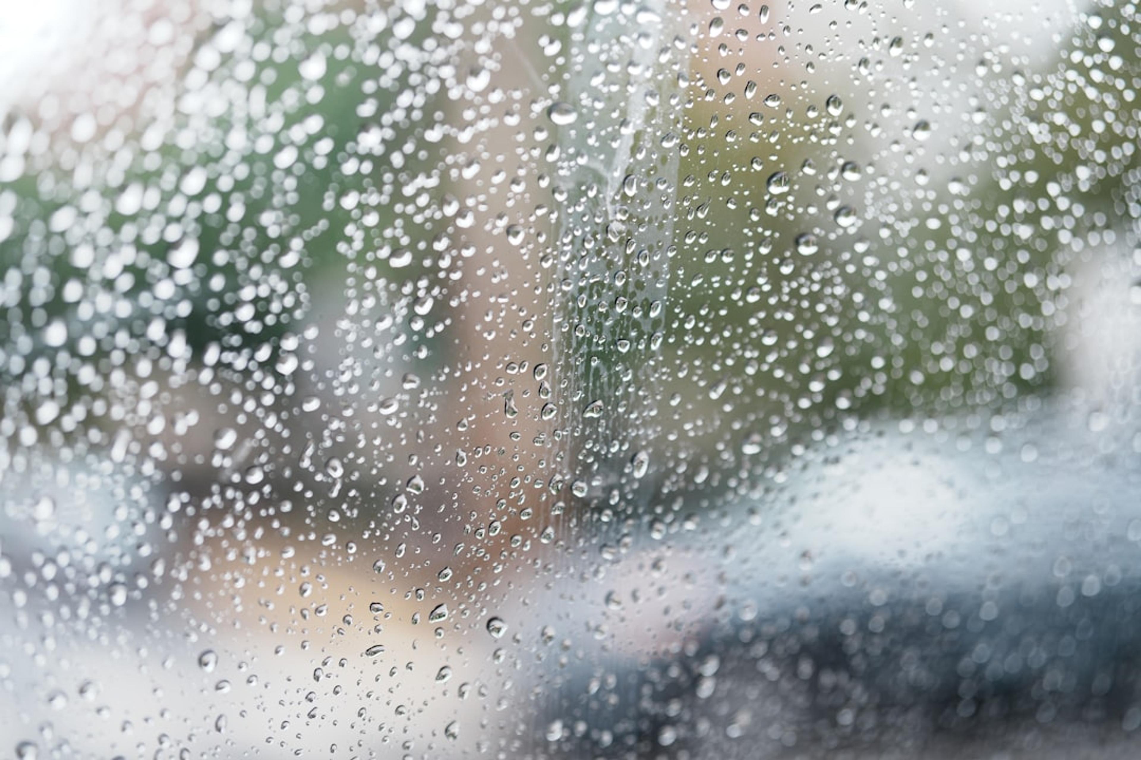 a window with rain drops on it