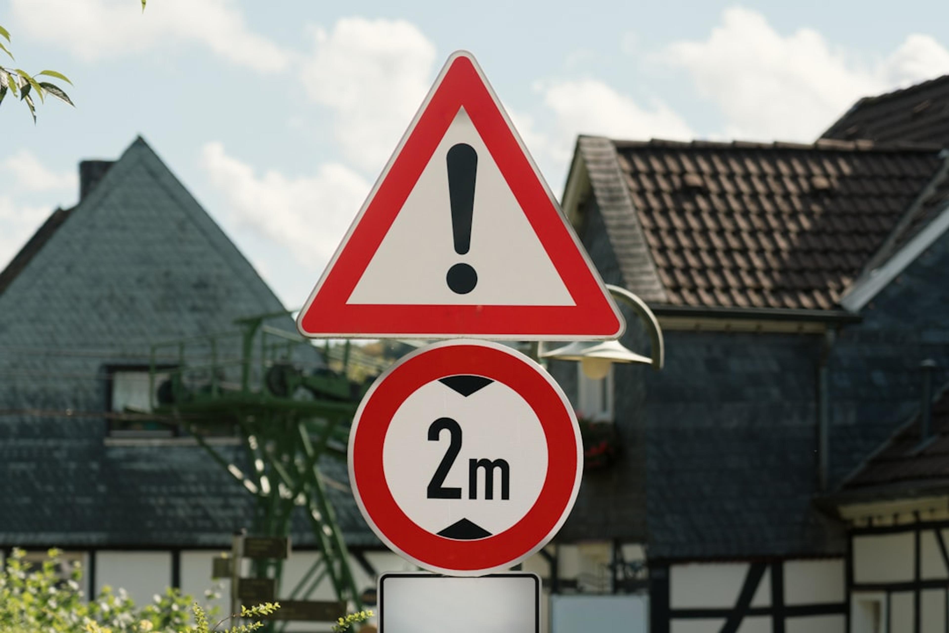 Warning sign with height restriction of 2 meters