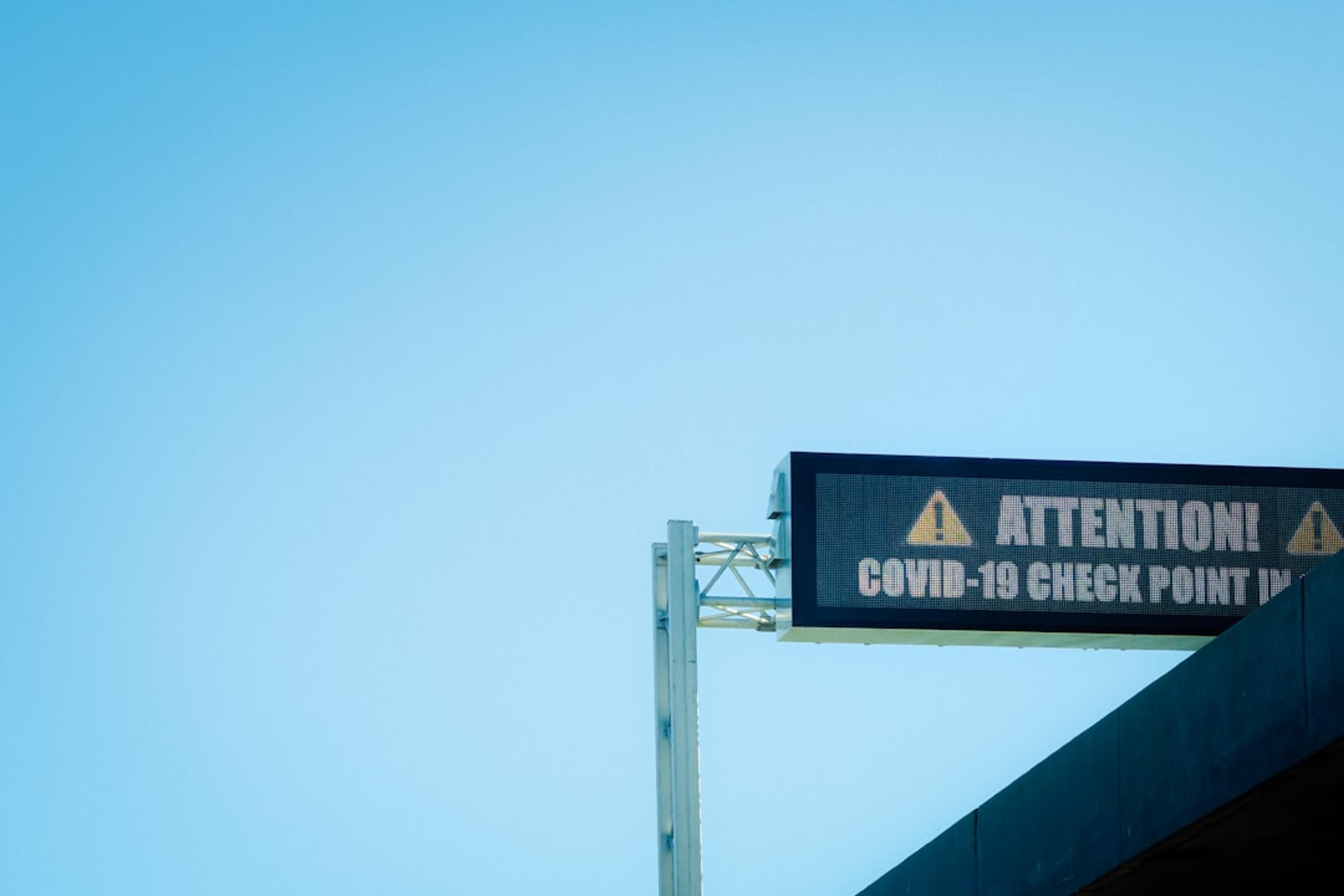 blue and white street sign