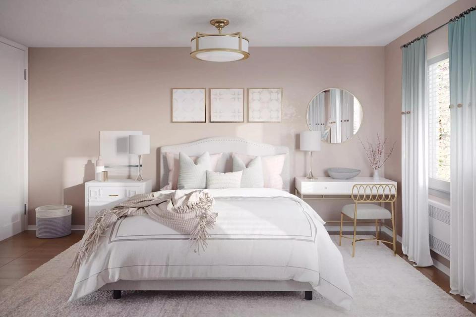 Soft romantic bedroom with blush tones, white linens, gentle coastal-inspired palette