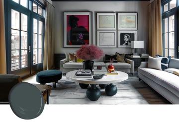 Contemporary living room blending deep navy walls with warm wood tones, modern artwork, and sculptural furniture for a gallery-like ambiance