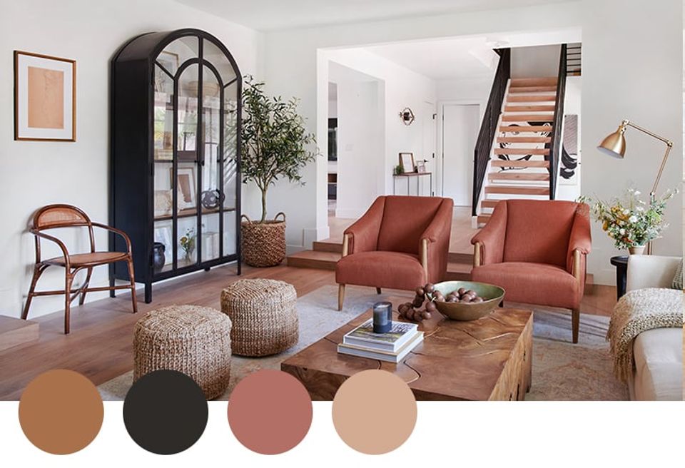 Warm terracotta and black mid-century modern living room with arched doorway, rust accent chairs, and natural wood tones creating inviting elegance.