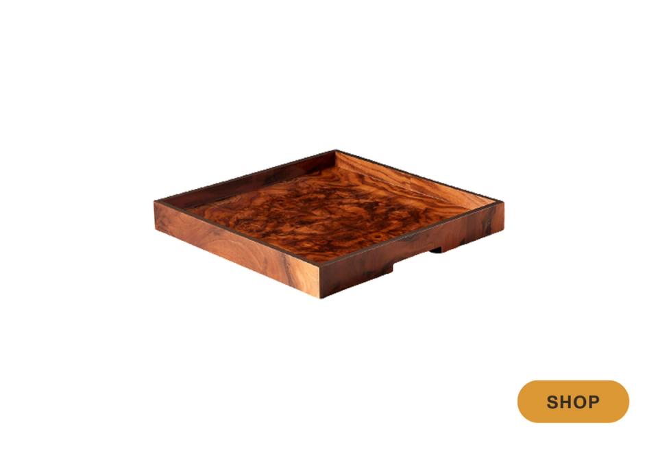 Rich cognac wood tray with deep grain and natural edge detailing