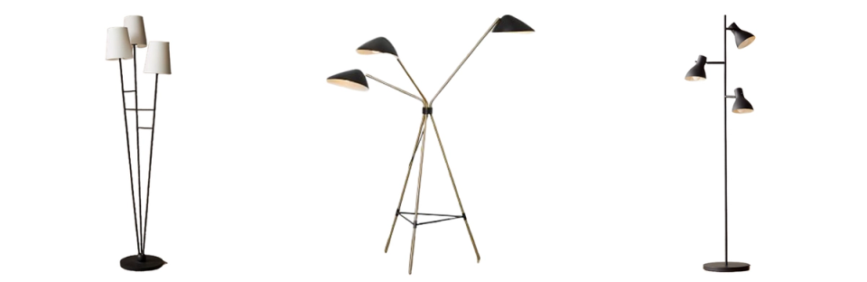 Three minimalist floor lamps featuring geometric metal frames and adjustable arms