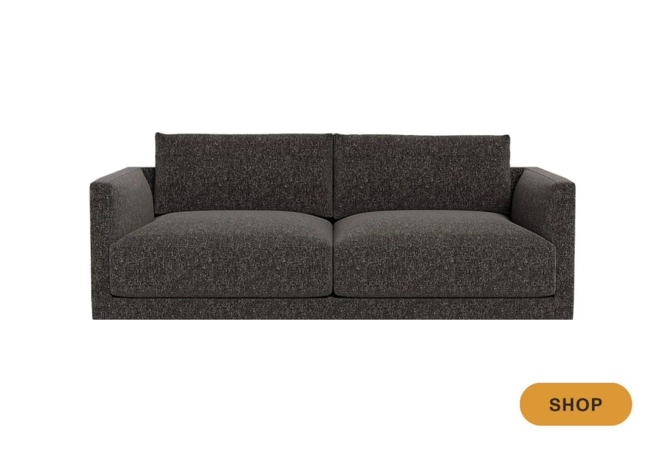 Modern charcoal textured sofa with clean lines and contemporary proportions