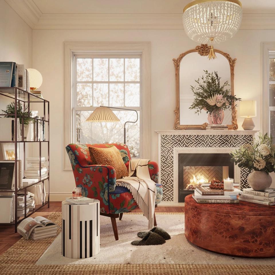 Warm, eclectic reading space with jewel-tone patterned chair, fireplace, brass accents, and cozy layered textures.