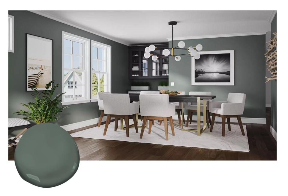 Open-concept dining space with deep green accent wall, mid-century seating, and natural light creating an inviting sophisticated environment