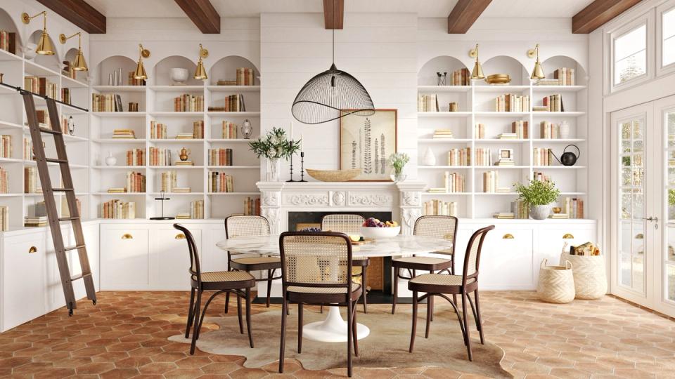 Scandinavian-inspired library with natural wood beams, wall-to-wall built-in shelving, and mid-century dining setup in light, airy tones