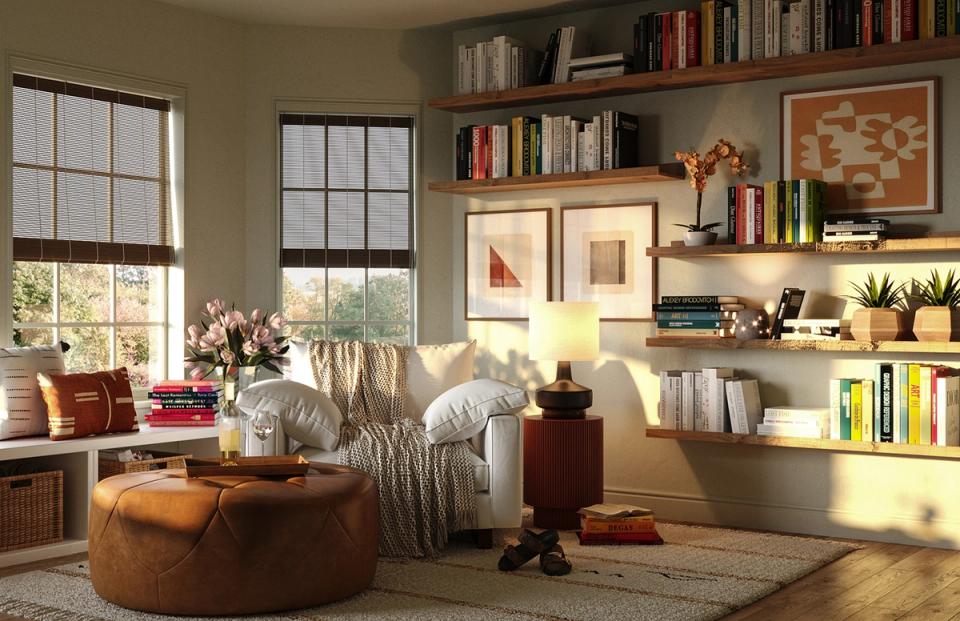 Contemporary living room with charcoal fireplace wall, warm wood accents, and cozy neutral seating in an industrial-modern style.
