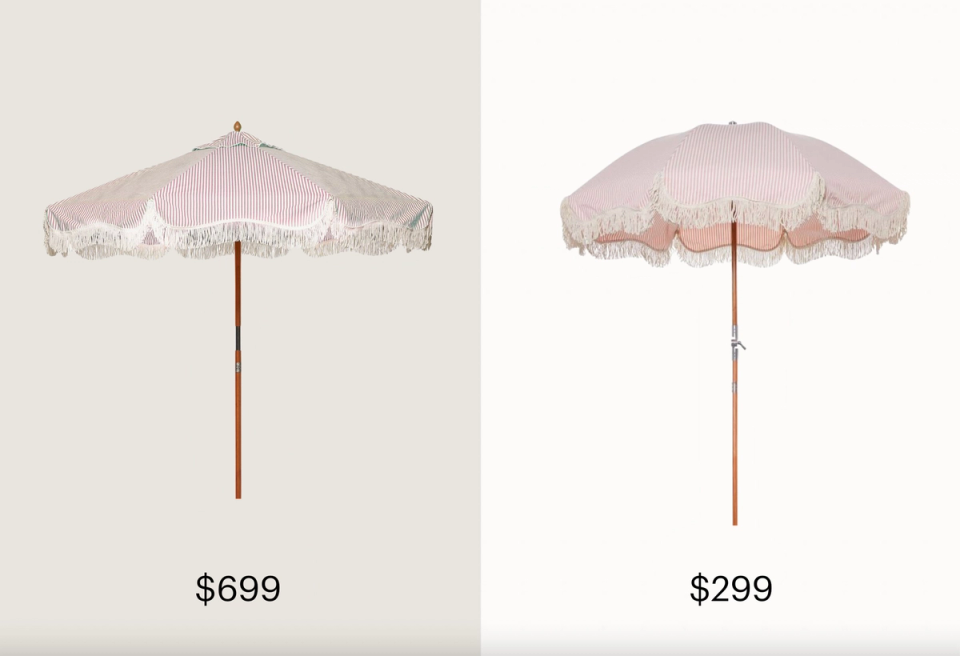 Vintage-inspired scalloped patio umbrellas in blush pink with decorative wooden poles
