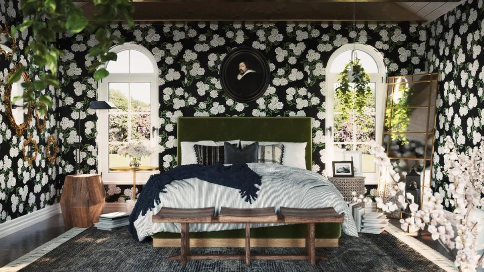 Cottagecore bedroom with dark floral wallpaper, wooden bed frame, and natural light from arched windows