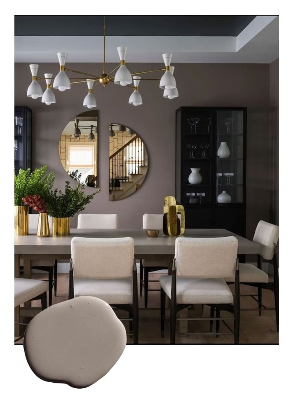 Sophisticated dining space with taupe walls, brass pendant lighting, round mirrors, and cream seating in contemporary chic design