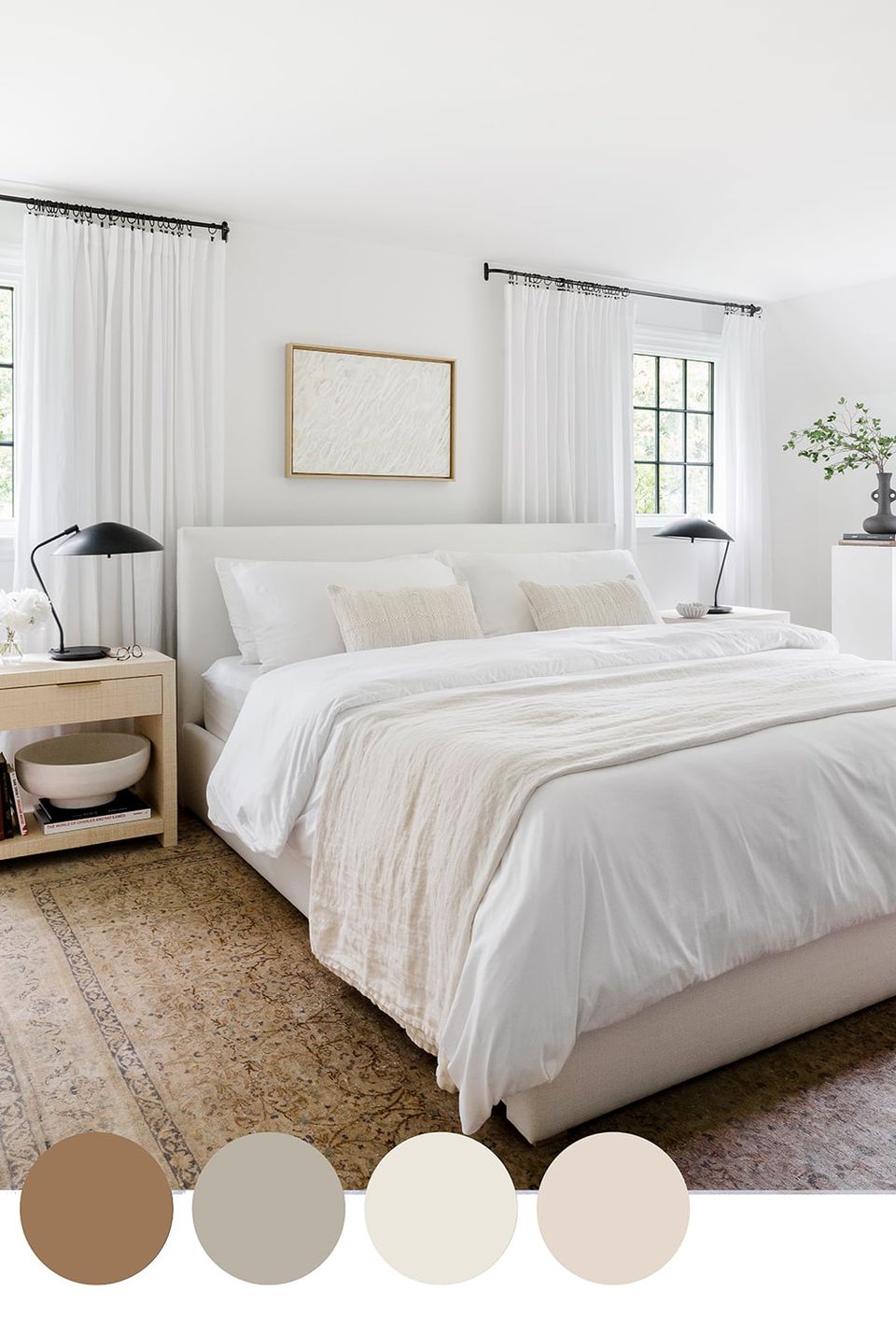 Minimalist modern bedroom in crisp whites and warm taupes with industrial black accents creating a clean, tranquil aesthetic.