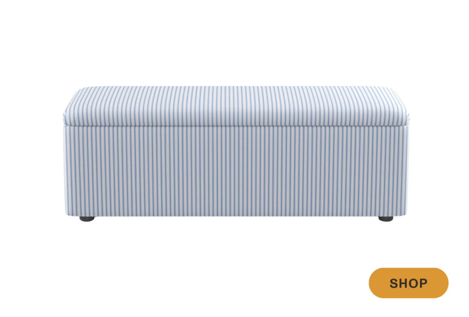 Blue and white striped upholstered bench with pleated texture, classic preppy elegance