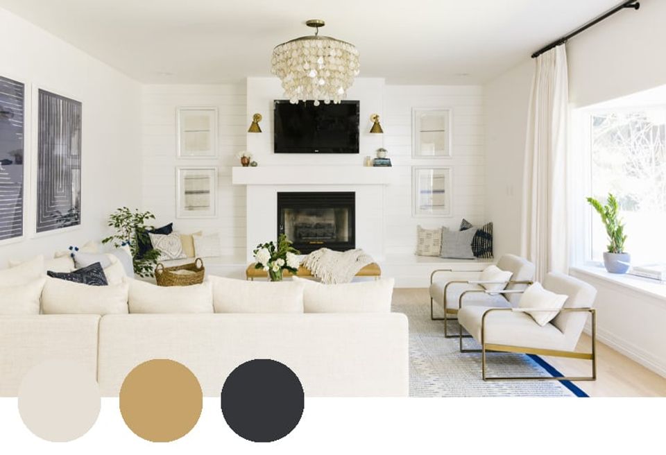 Bright transitional living room with cream, gold, and charcoal accents, featuring fireplace styling and timeless neutral warmth