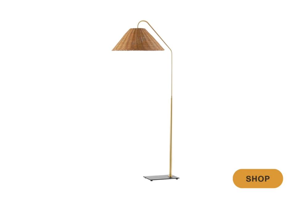 Scandinavian-inspired arc floor lamp with warm wood shade and clean lines