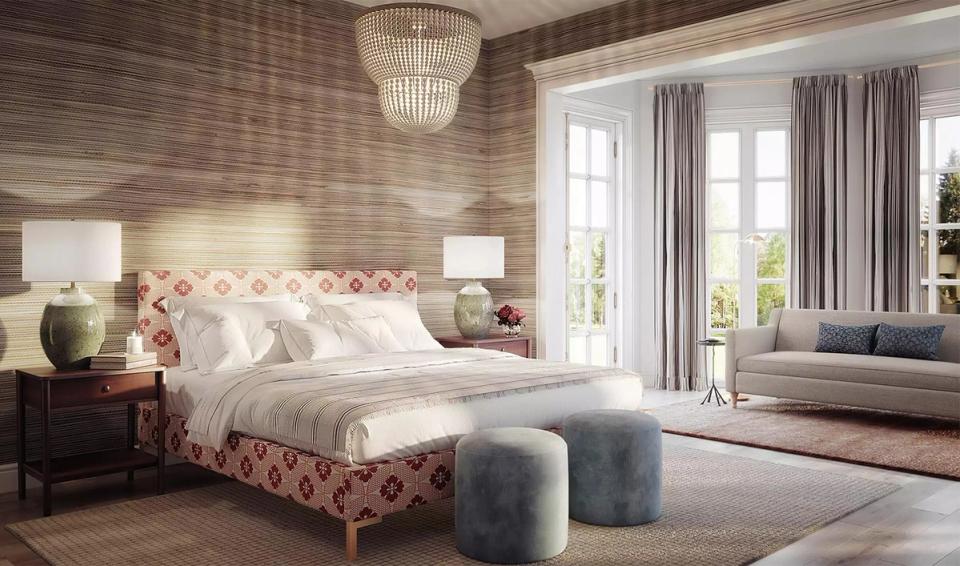 Romantic master bedroom with patterned headboard, warm wood tones, and soft taupe palette
