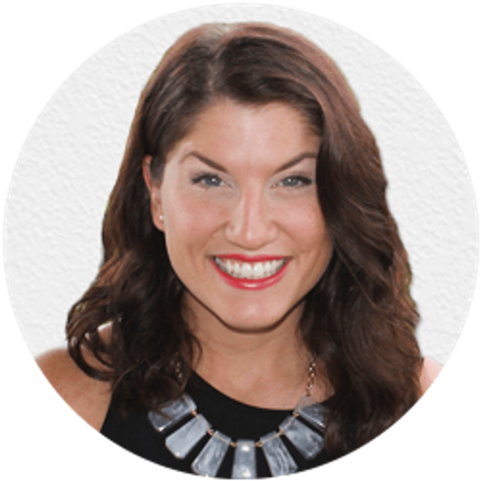 Designer Jordan E., smiling portrait headshot with statement necklace