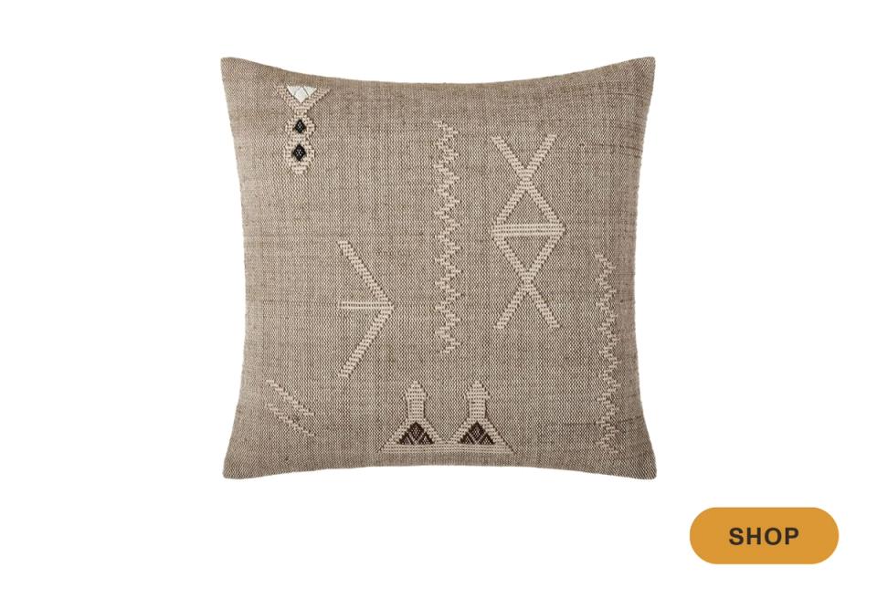 Taupe pillow with minimalist tribal geometric line embroidery