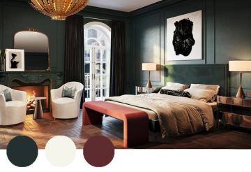 Sophisticated bedroom with deep forest green walls, warm wood tones, burgundy accents, and modern mid-century styling.
