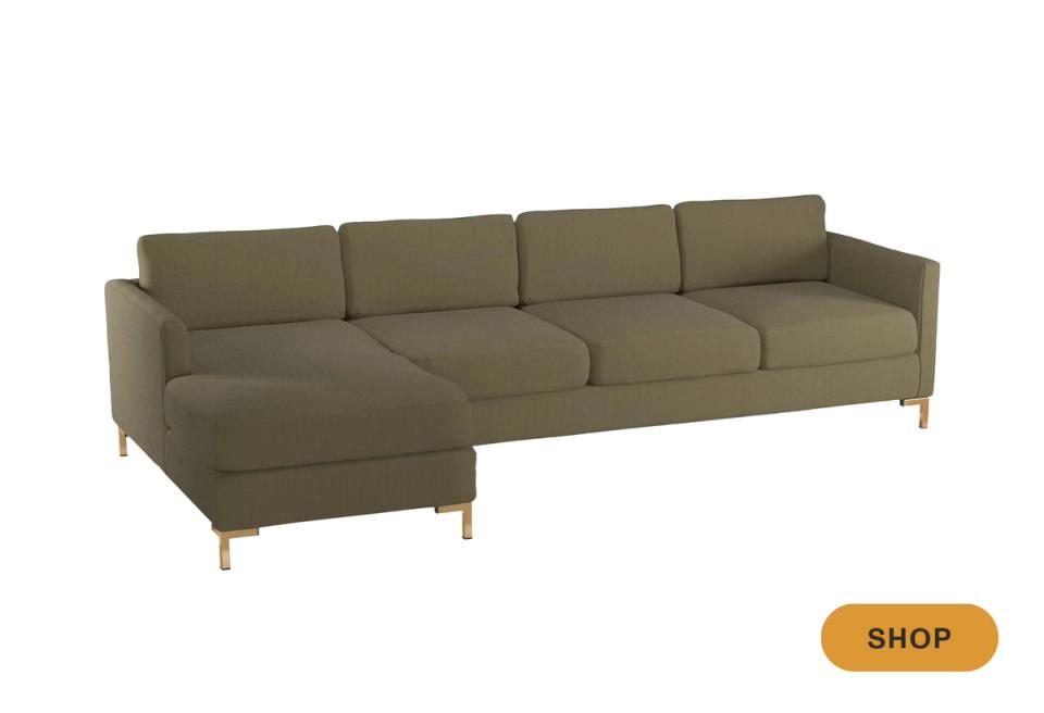 Modern olive green sectional with clean lines and natural wood base detailing