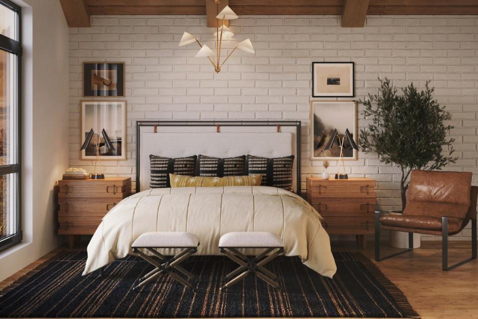 Southwestern bedroom with striped bedding, wood nightstands, and geometric patterned rug