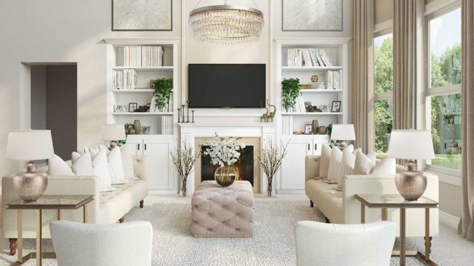 Sophisticated traditional interior with white built-ins, cream seating, warm wood accents, and gallery-style wall display