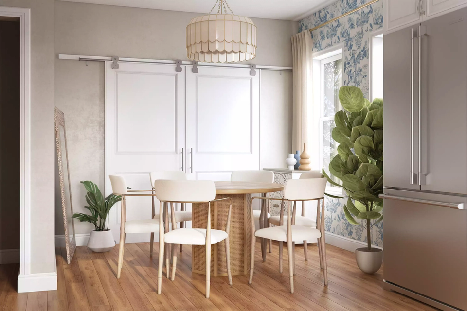 Bright Scandinavian dining area with natural wood table, white chairs, rattan pendant, and botanical styling