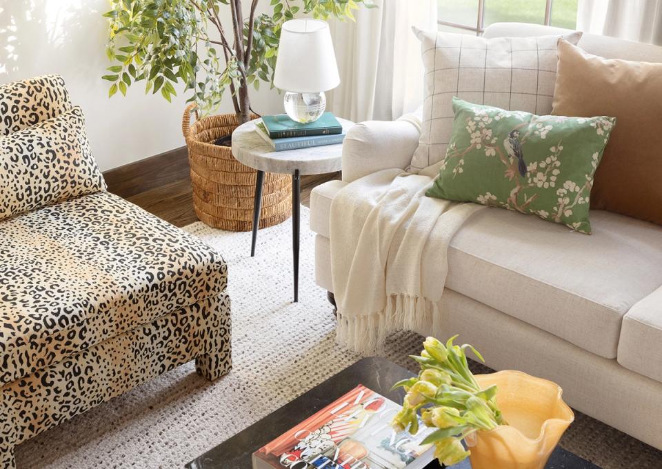 Eclectic living room blending animal print, natural textures, and layered neutral tones
