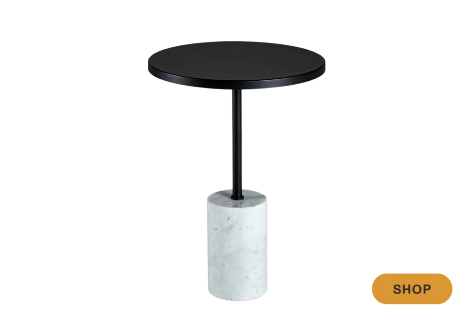 Contemporary black and marble martini table with sleek metal stem and modern silhouette