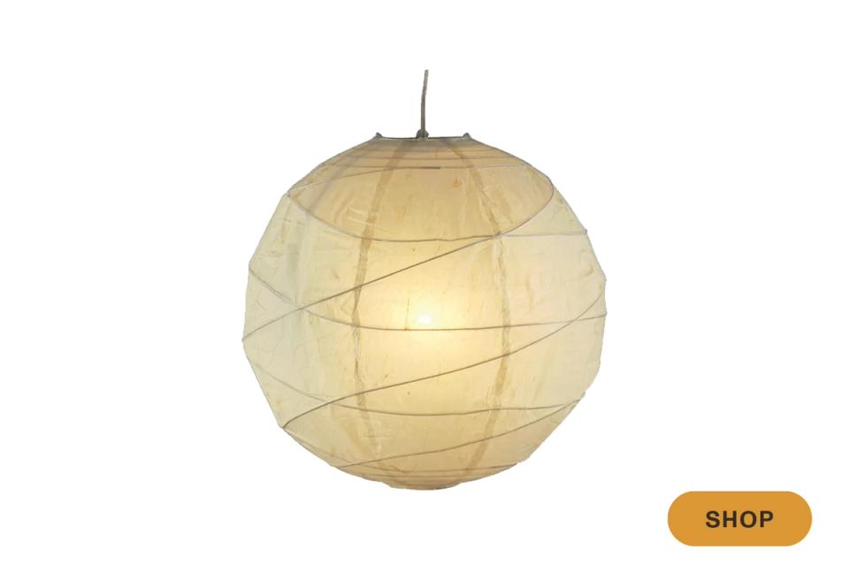 Warm cream rice paper globe pendant with geometric wire detailing