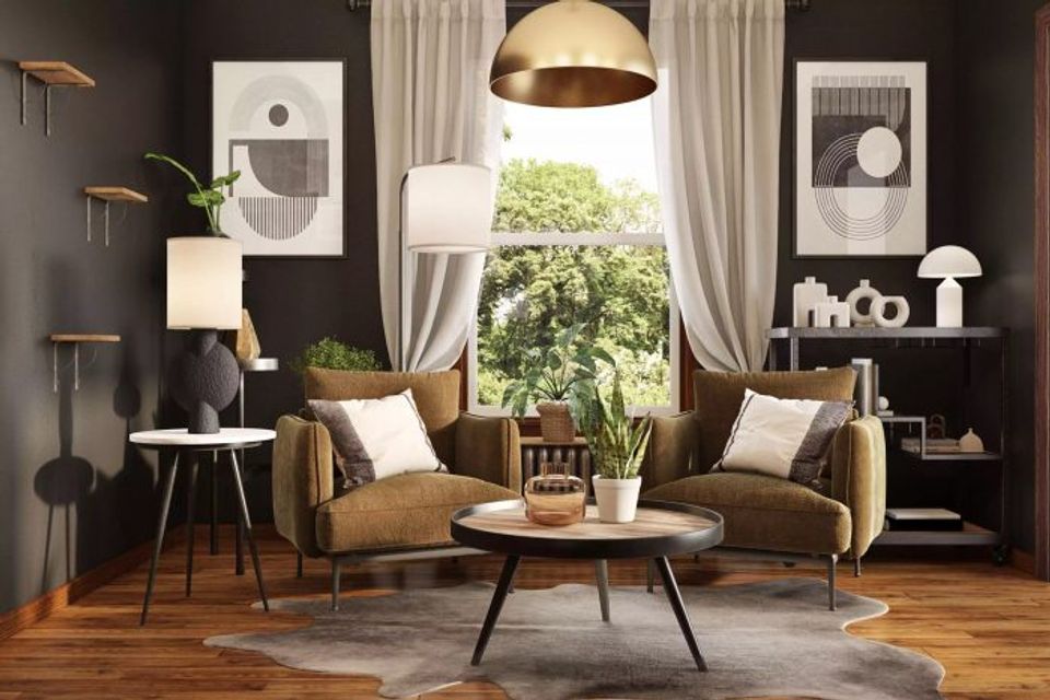 Mid-century modern living room with black accent wall, caramel leather seating, brass pendant light, and warm wood flooring creating sophisticated comfort