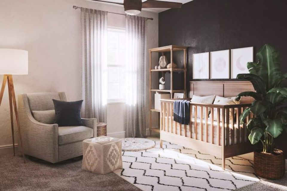 Scandinavian nursery with dark charcoal accent wall, natural wood crib, neutral textiles, and soft green plants for a serene, balanced atmosphere.