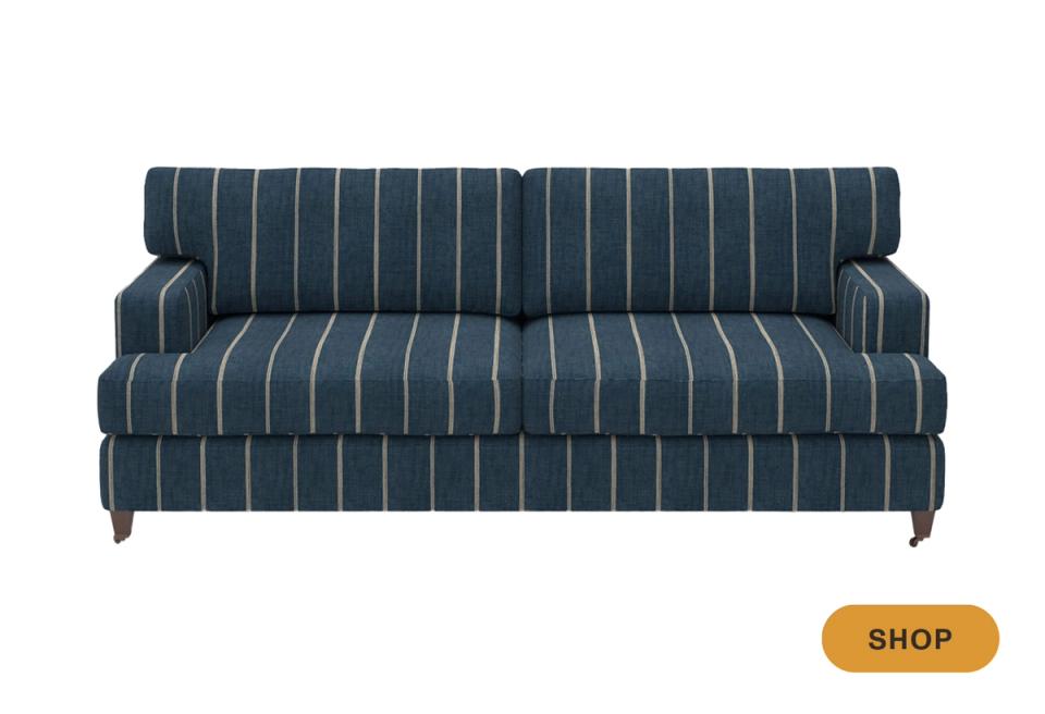 Navy pinstriped traditional sofa with rolled arms and classic tailored appeal