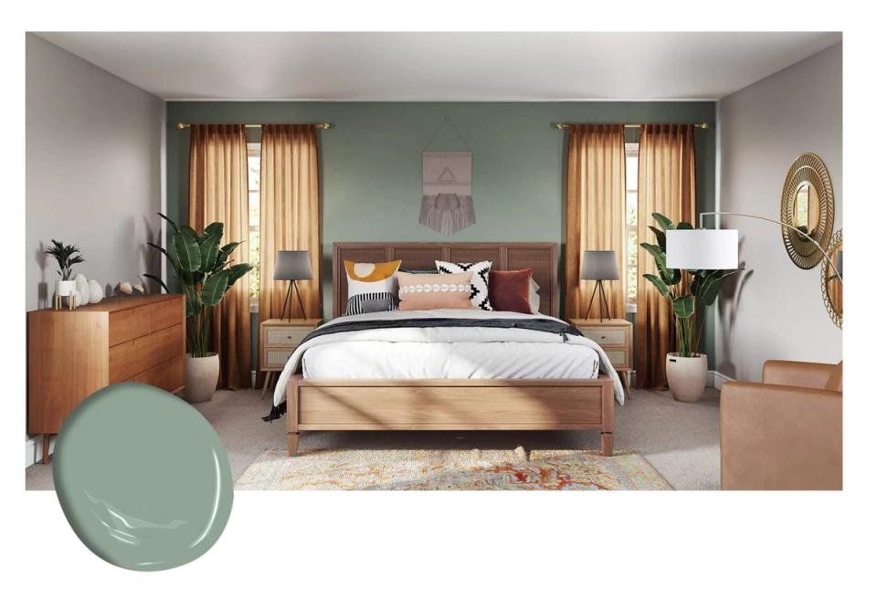 Tranquil bedroom with soft sage green accent wall, warm wood mid-century bed, and golden curtains evoking peaceful, earthy elegance