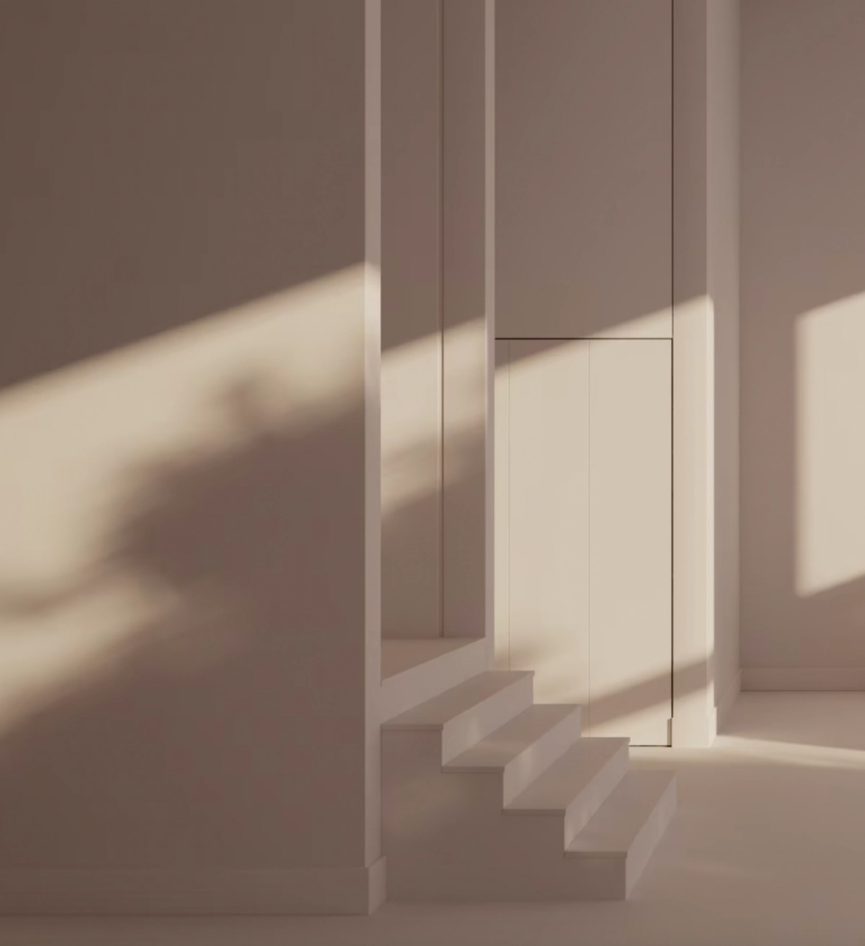 Minimalist stairwell with soft taupe walls, geometric paneling, and natural light creating serene, understated modern architecture.
