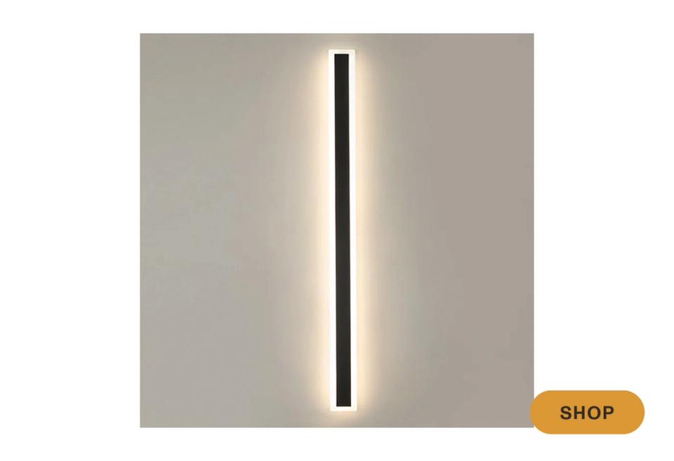 Modern linear sconce with sleek black profile and integrated warm-white LED lighting