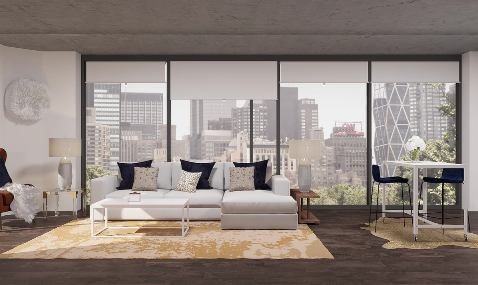 Minimalist contemporary living room with neutral palette, floor-to-ceiling windows, and city skyline view