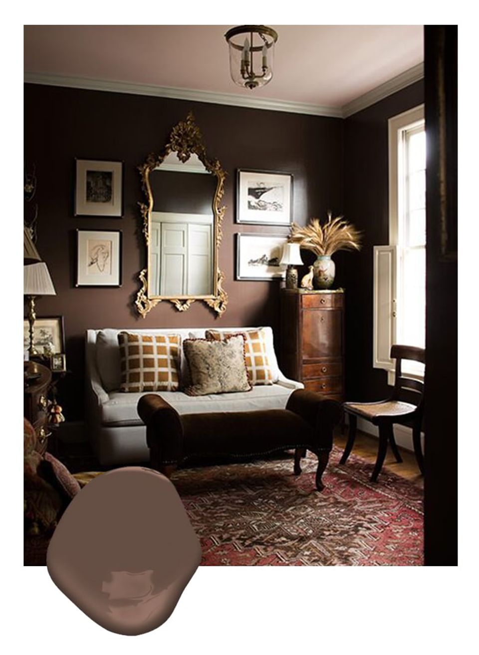 Moody chocolate brown den with ornate mirrors, jewel-toned accents, and vintage furnishings evoking classic, sophisticated elegance