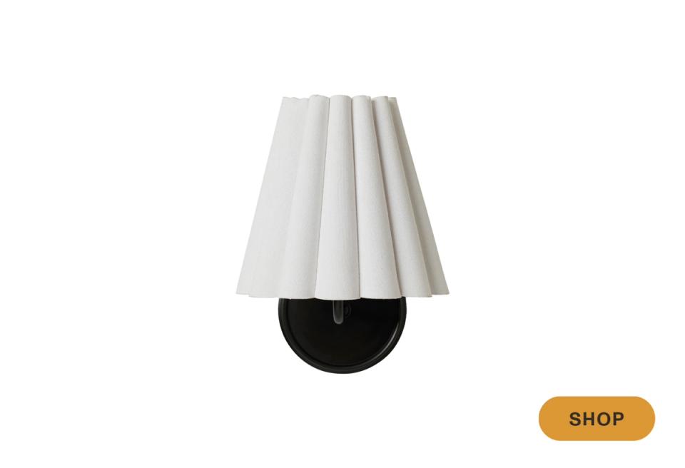 Modern black and white pleated shade pendant with minimalist silhouette